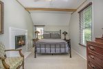 Experience the Private Fireplace in the Second Bedroom on the Upper Level with a Queen Bed